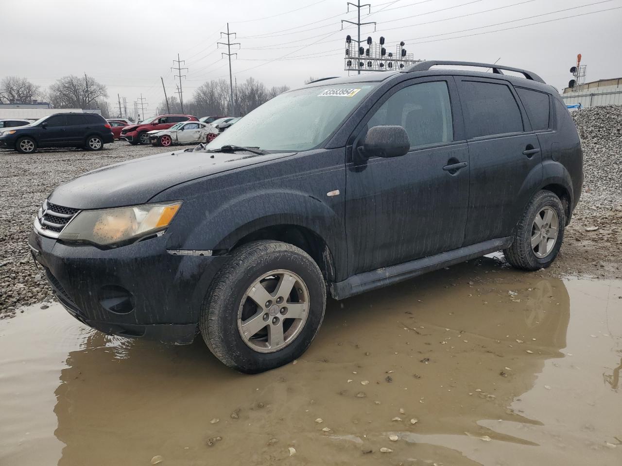 2009 Mitsubishi Outlander Es VIN: JA4LT21W69Z010330 Lot: 83583954