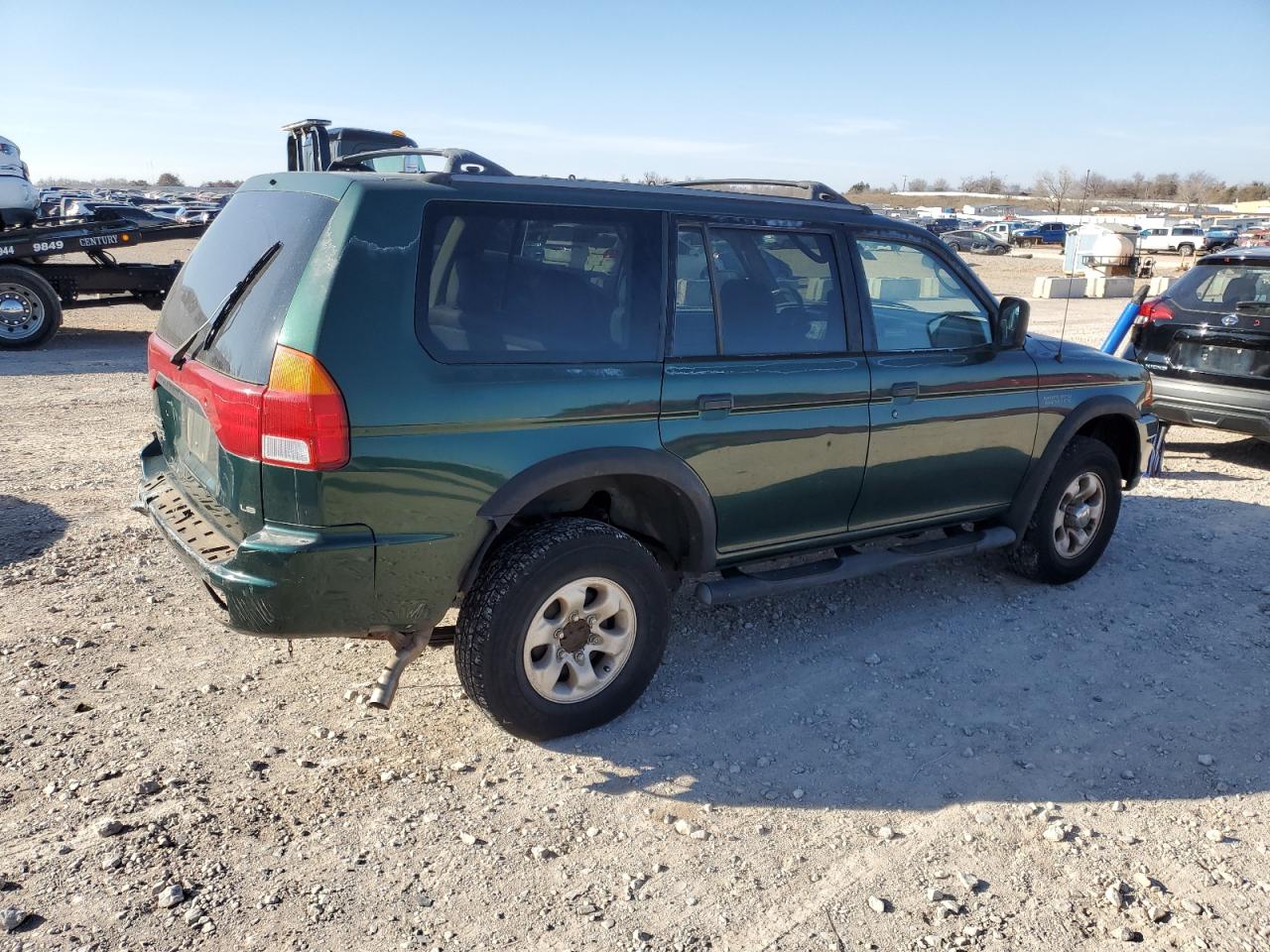 1999 Mitsubishi Montero Sport Ls VIN: JA4LS31H5XP033598 Lot: 85609464