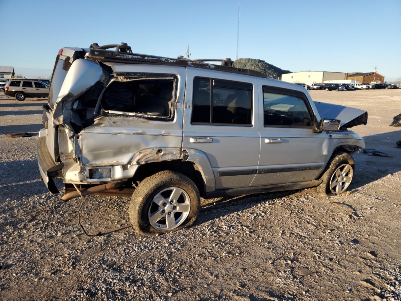 2007 Jeep Commander VIN: 1J8HG48K37C647845 Lot: 83846524