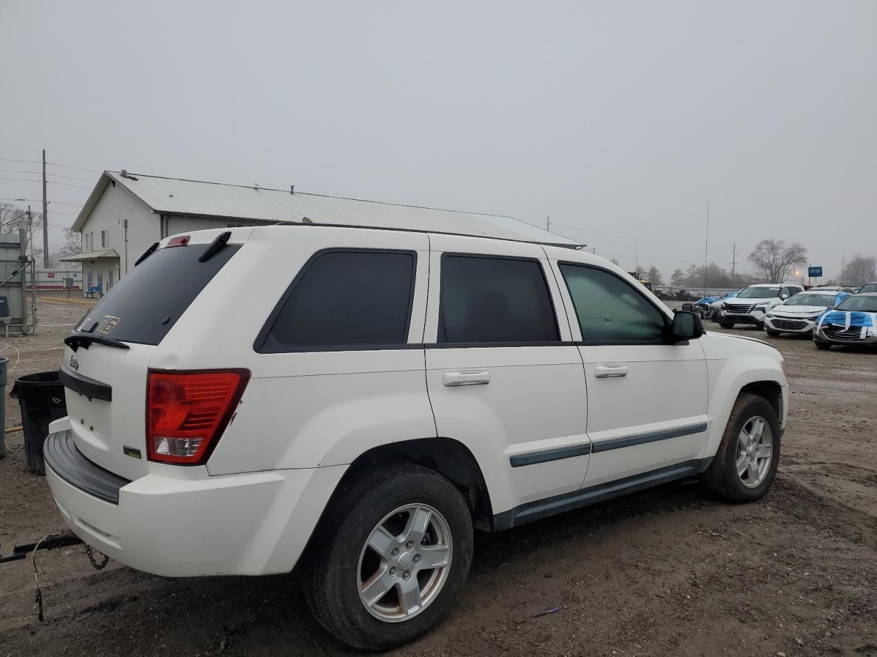 2007 Jeep Grand Cherokee Laredo VIN: 1J8HR48PX7C696143 Lot: 85585174