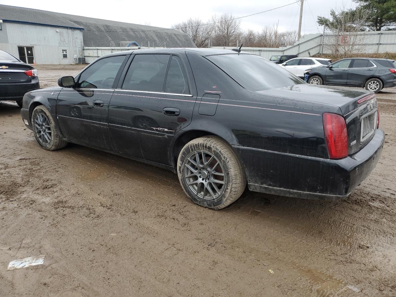 2005 Cadillac Deville Dts VIN: 1G6KF57925U220641 Lot: 84383044