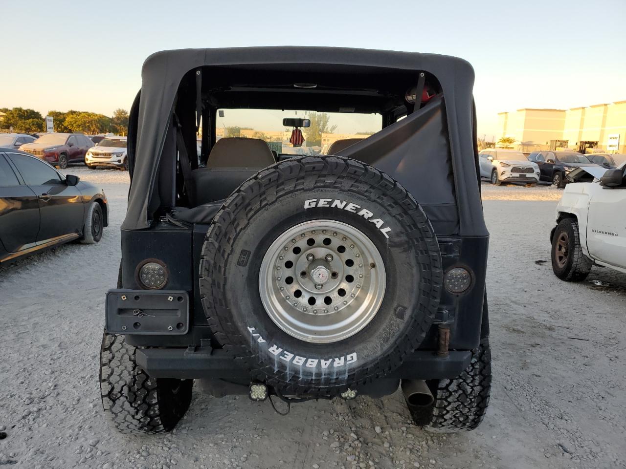 1999 Jeep Wrangler / Tj Sport VIN: 1J4FY19S2XP492216 Lot: 84061754