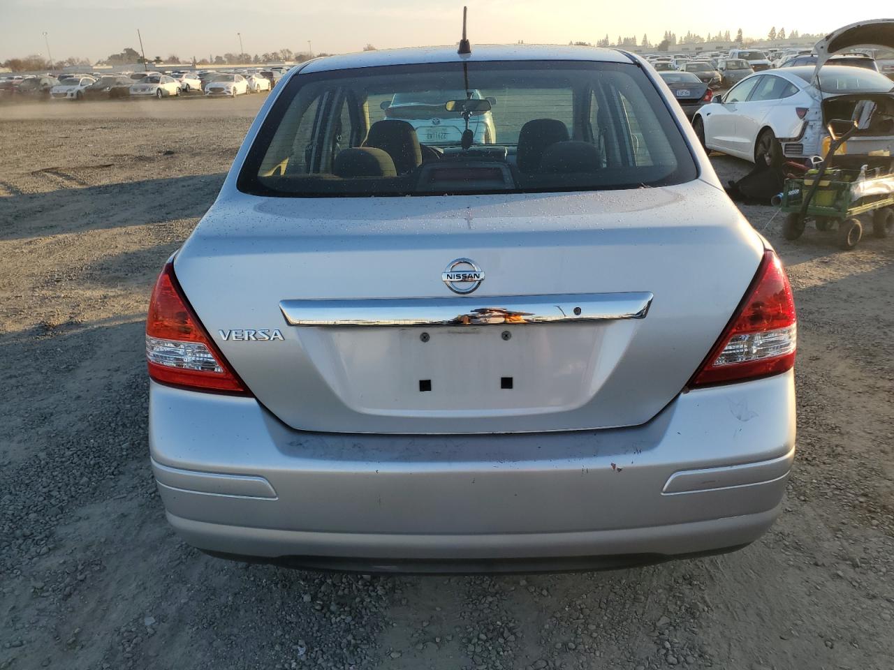 2010 Nissan Versa S VIN: 3N1BC1AP3AL404290 Lot: 83466794