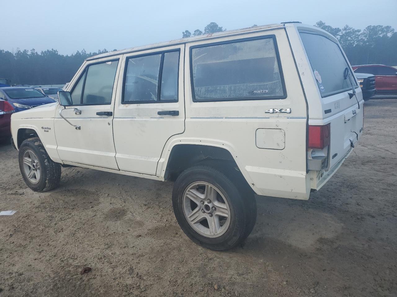 1987 Jeep Cherokee Pioneer VIN: 1JCMR7829HT163602 Lot: 85463784