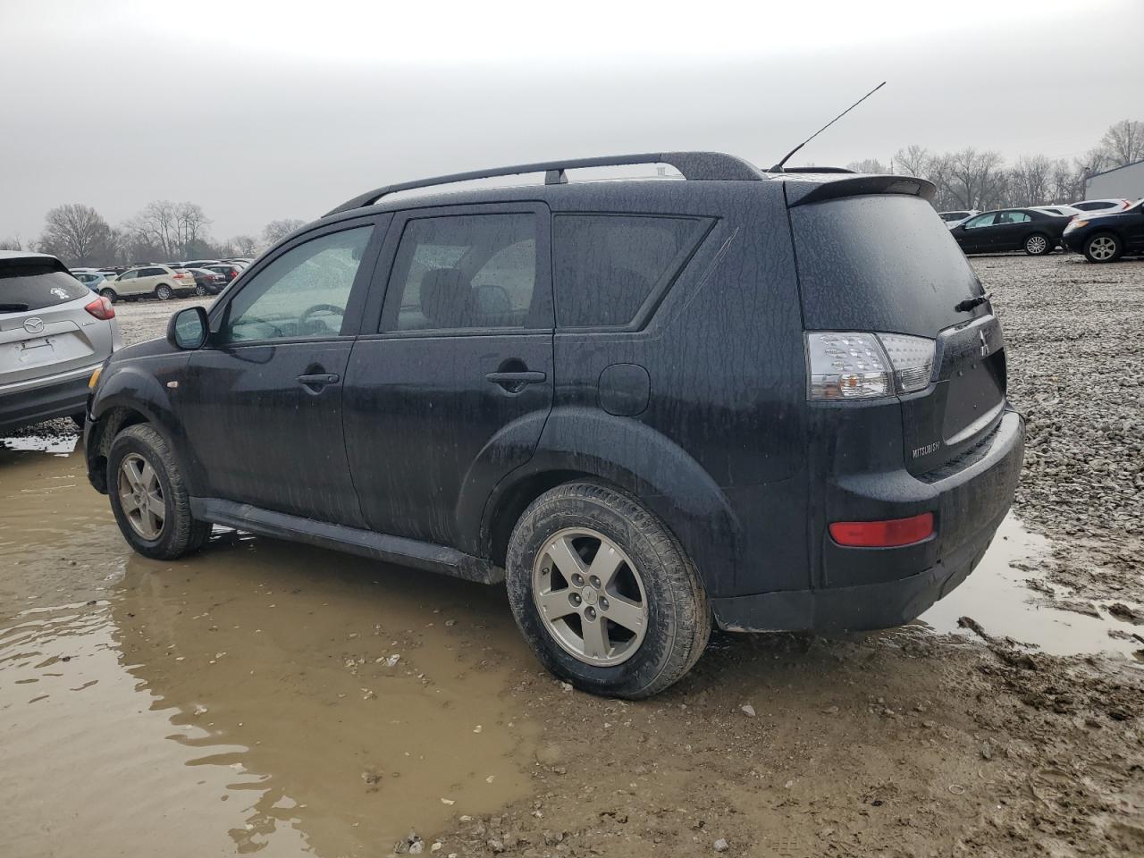 2009 Mitsubishi Outlander Es VIN: JA4LT21W69Z010330 Lot: 83583954