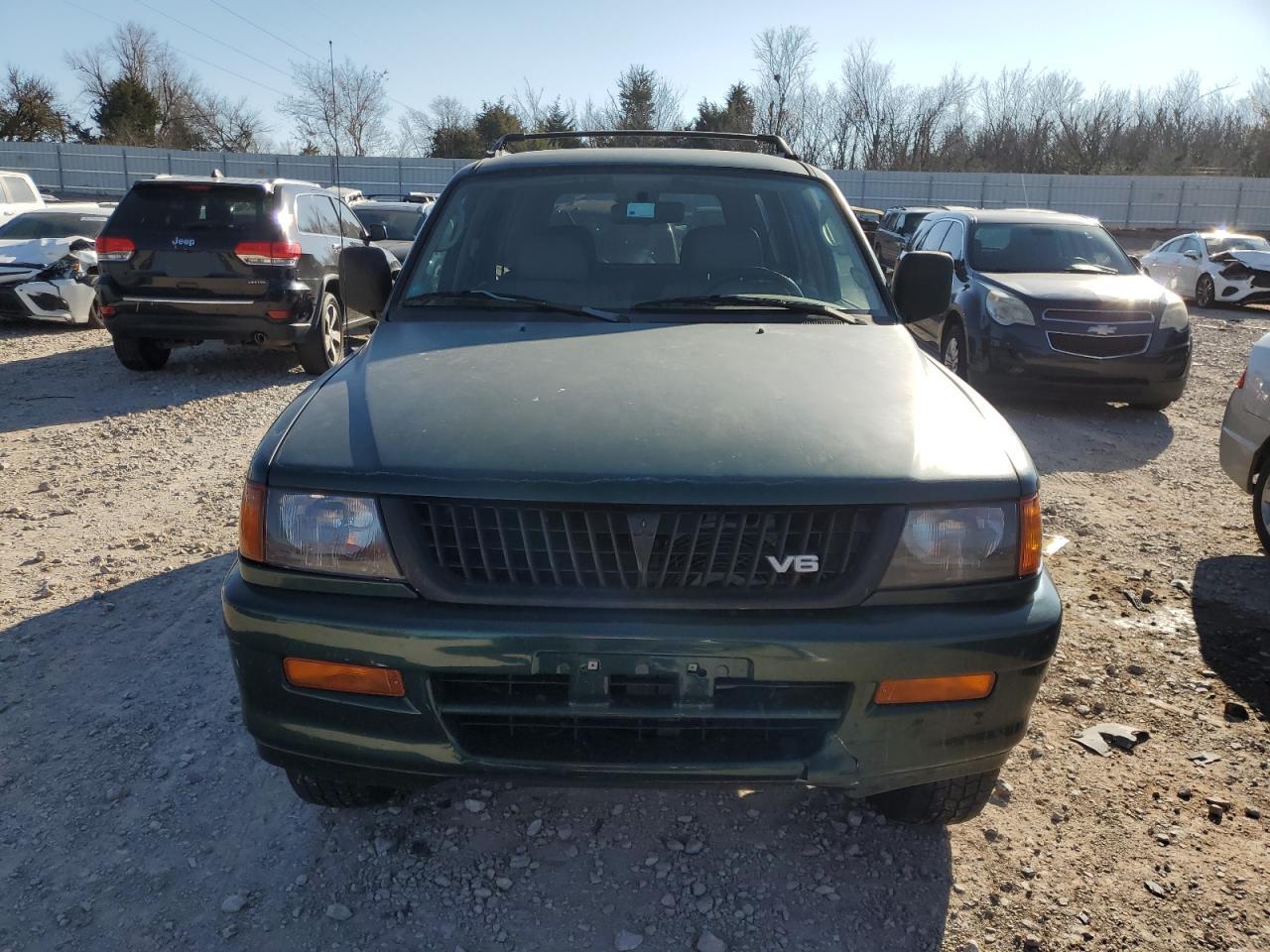 1999 Mitsubishi Montero Sport Ls VIN: JA4LS31H5XP033598 Lot: 85609464