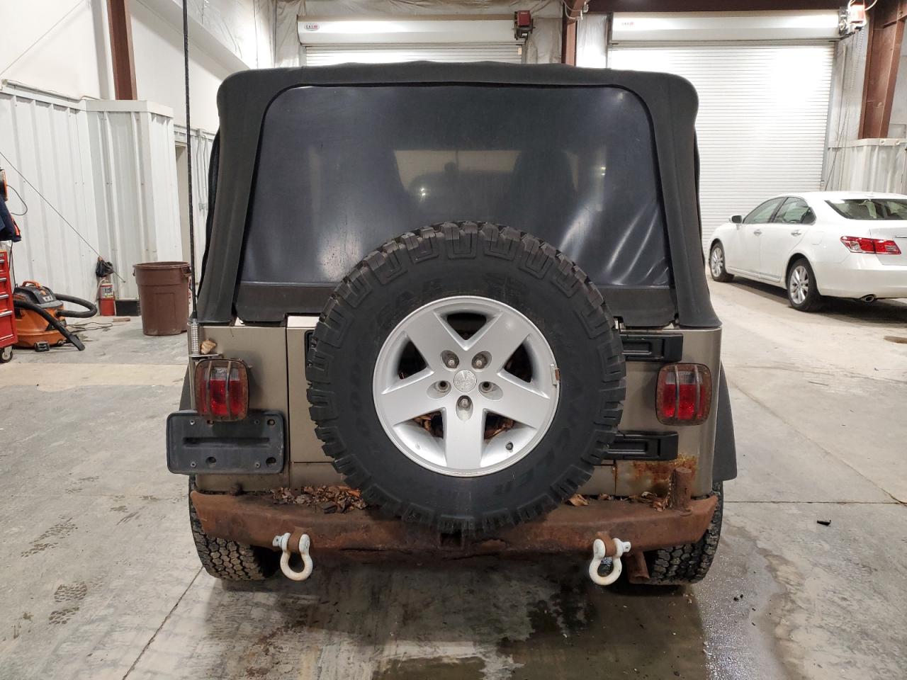 2004 Jeep Wrangler / Tj Rubicon VIN: 1J4FA69S34P785281 Lot: 86594874