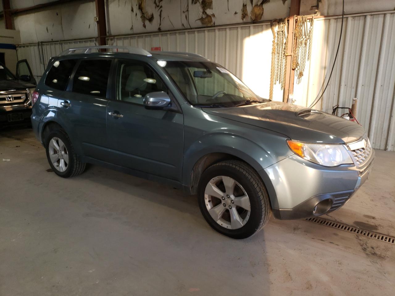 2011 Subaru Forester Touring VIN: JF2SHGGC9BH739108 Lot: 86813654