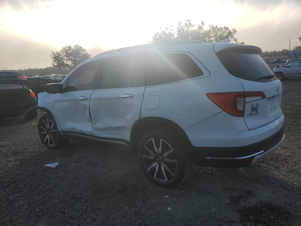 2021 Honda Pilot Touring VIN: 5FNYF5H68MB001010 Lot: 85095564