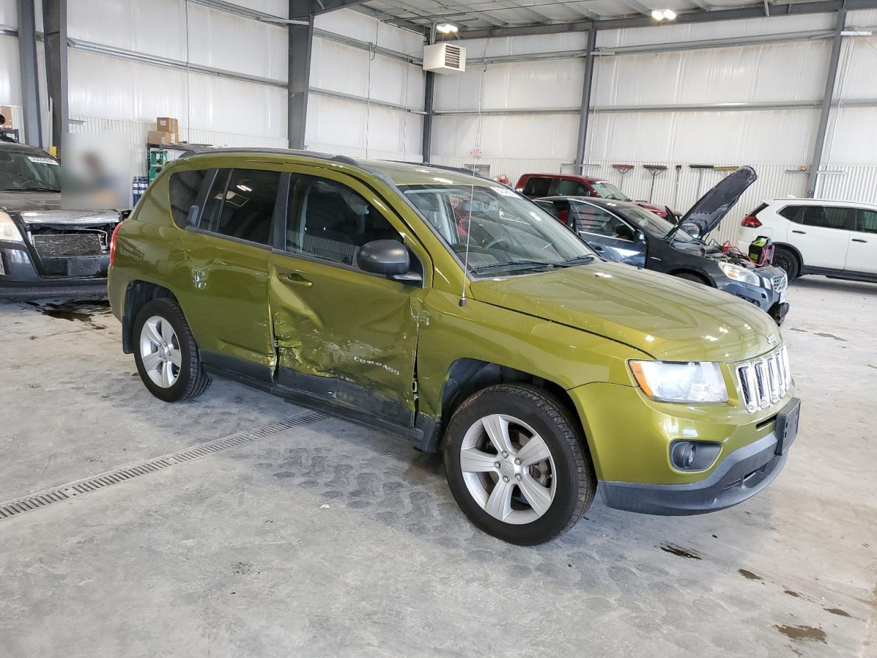 2012 Jeep Compass Sport VIN: 1C4NJCBA2CD677493 Lot: 84546604