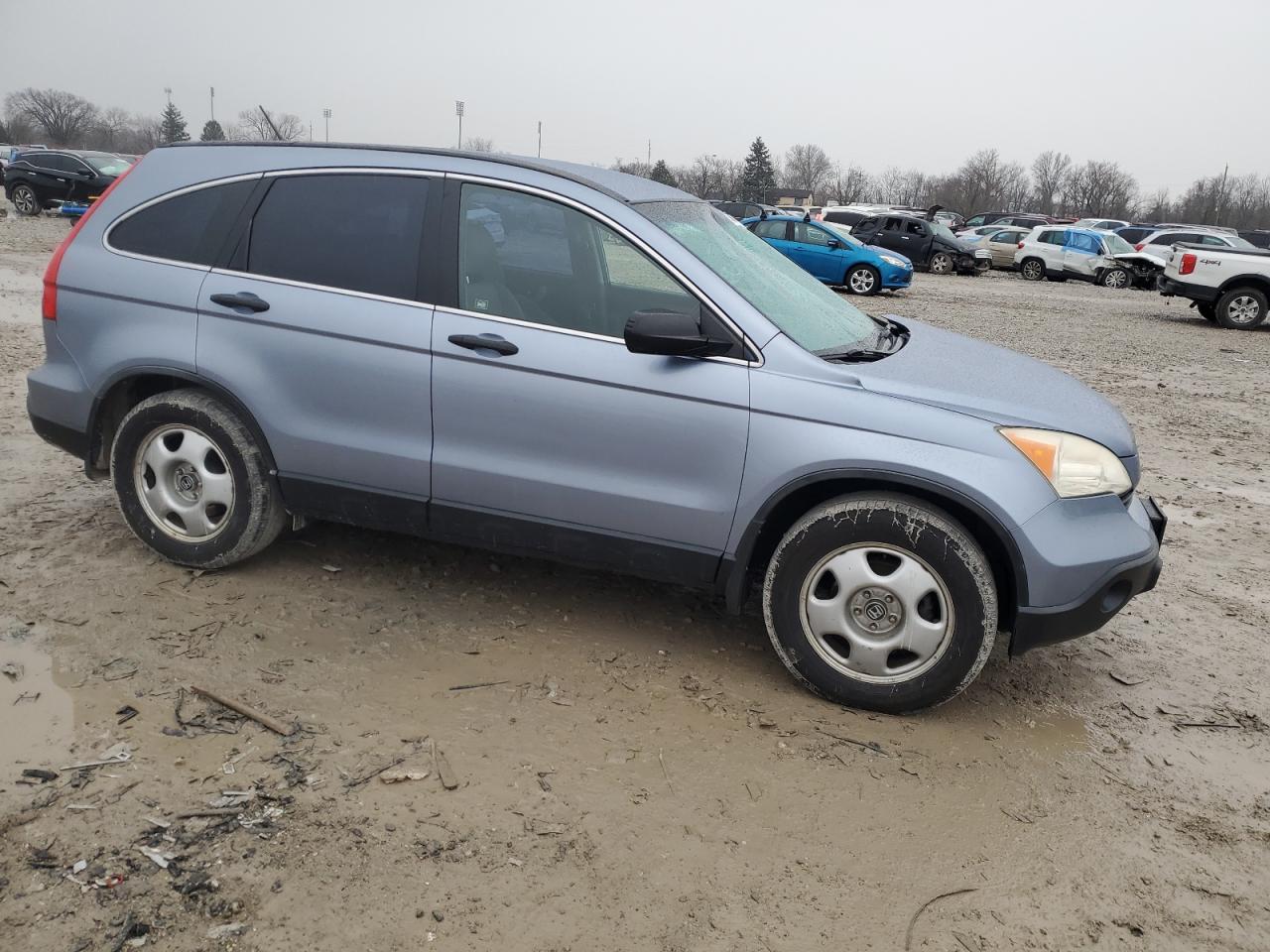 2007 Honda Cr-V Lx VIN: JHLRE48347C011593 Lot: 85684214