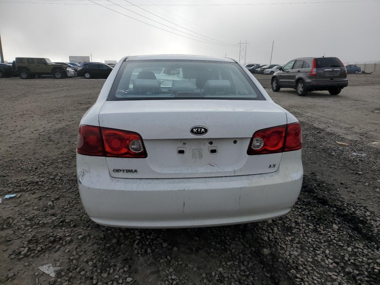 2006 Kia Optima Lx VIN: KNAGE123065056204 Lot: 83910504