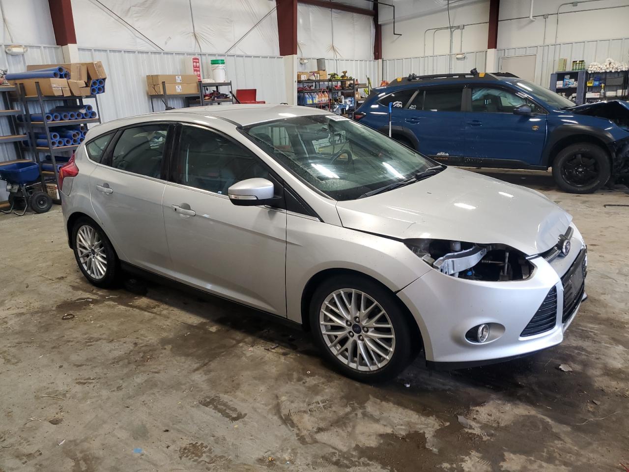 2014 Ford Focus Titanium VIN: 1FADP3N29EL340249 Lot: 86011464