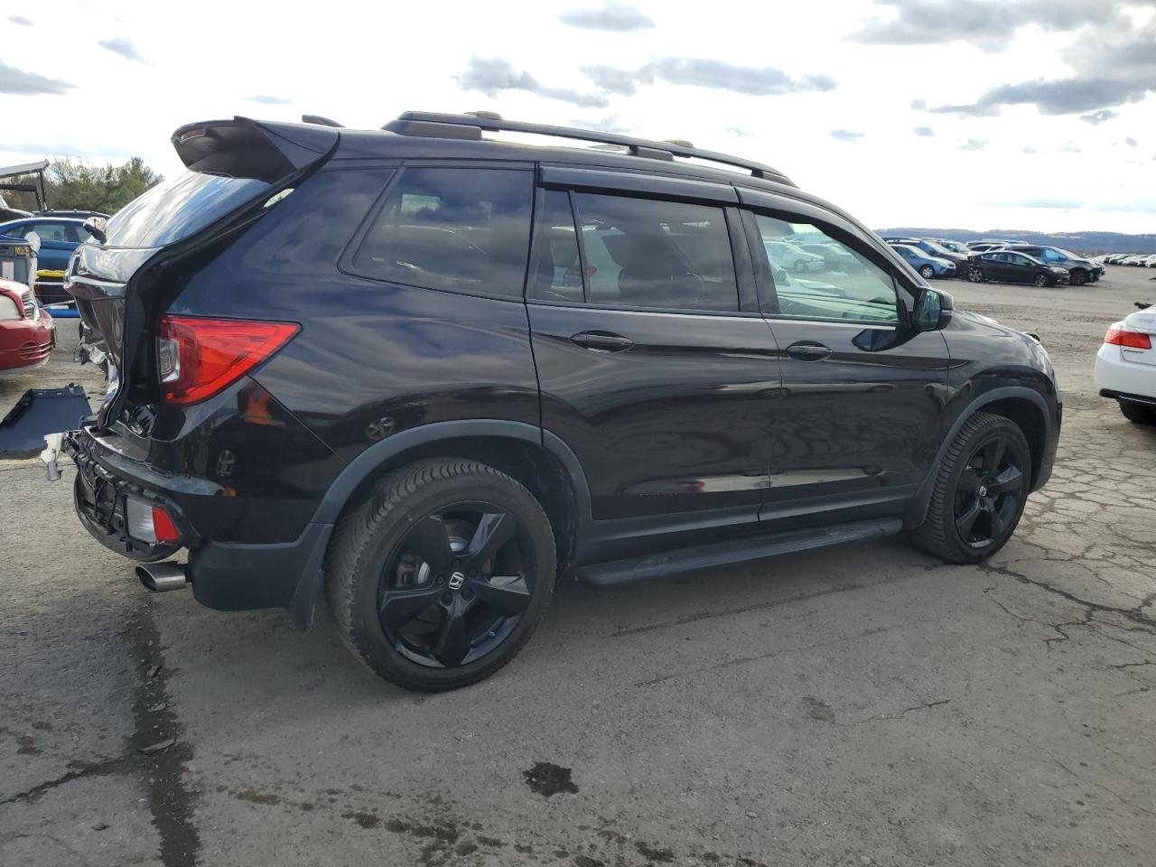 2020 Honda Passport Elite VIN: 5FNYF8H06LB018531 Lot: 86559494