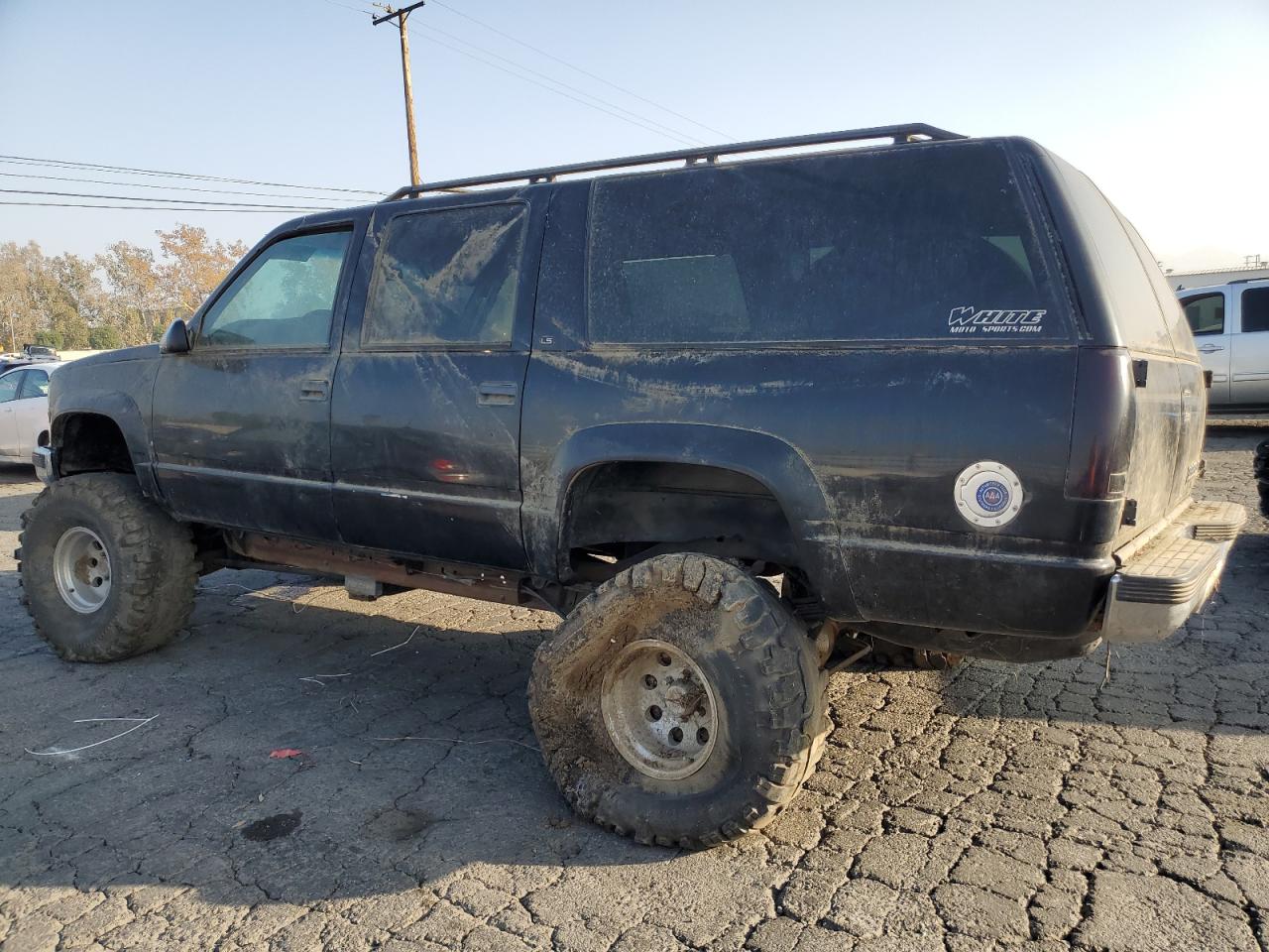 1996 Chevrolet Suburban K1500 VIN: 1GNFK16R4TJ409561 Lot: 83247624