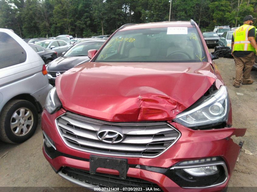 2017 Hyundai Santa Fe Sport 2.4L VIN: 5XYZUDLB4HG389831 Lot: 37121438