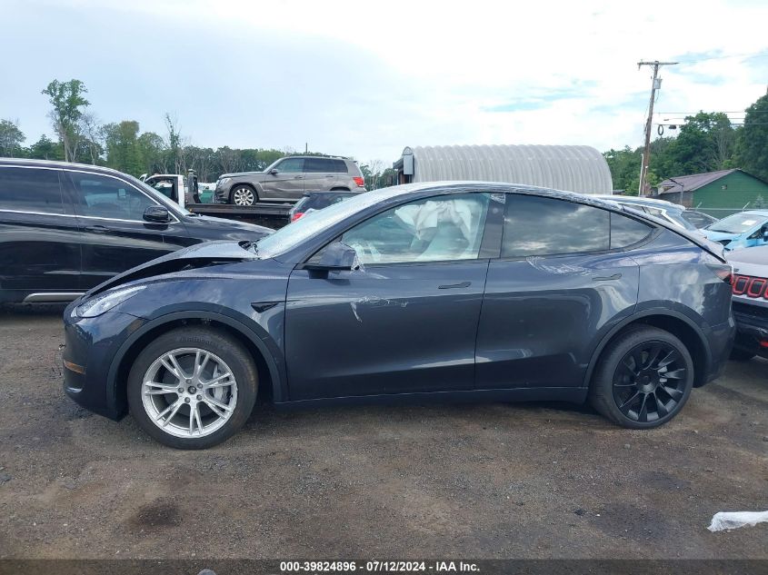 2024 Tesla Model Y Long Range Dual Motor All-Wheel Drive VIN: 7SAYGDEE6RA281987 Lot: 39824896