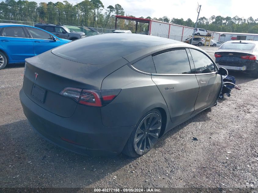 2021 Tesla Model 3 Standard Range Plus Rear-Wheel Drive VIN: 5YJ3E1EA5MF987787 Lot: 40277188