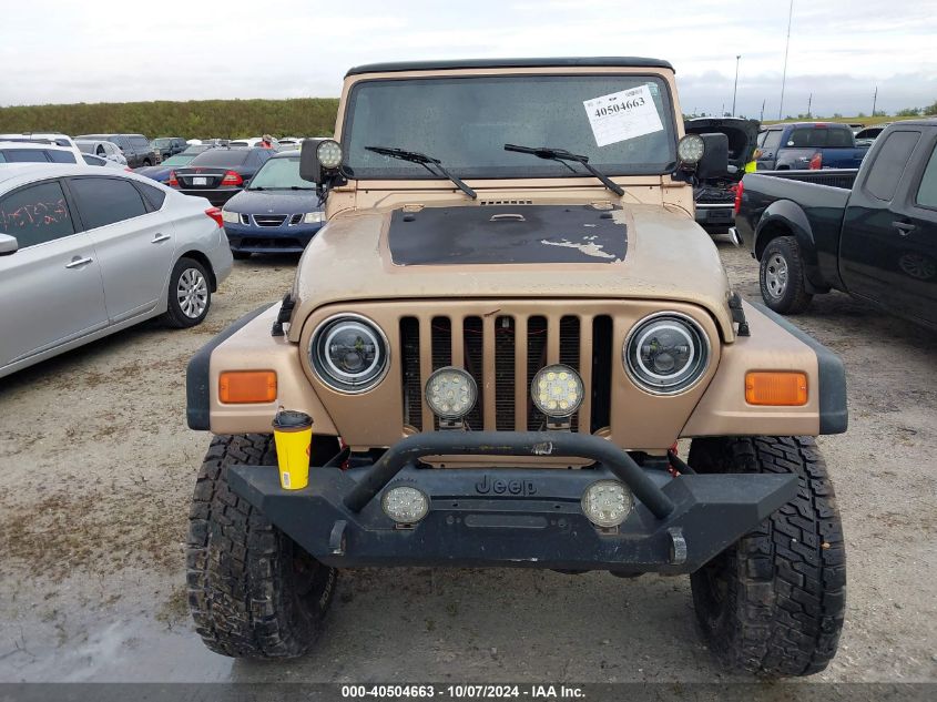 2000 Jeep Wrangler / Tj Sport VIN: 1J4FA49S5YP738330 Lot: 40504663