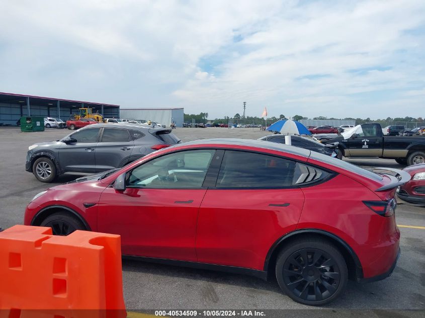 2023 Tesla Model Y Awd/Long Range Dual Motor All-Wheel Drive VIN: 7SAYGDEE4PF707613 Lot: 40534509