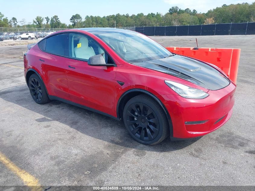 2023 Tesla Model Y Awd/Long Range Dual Motor All-Wheel Drive VIN: 7SAYGDEE4PF707613 Lot: 40534509