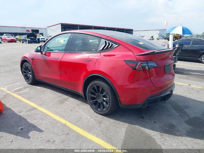 2023 Tesla Model Y Awd/Long Range Dual Motor All-Wheel Drive VIN: 7SAYGDEE4PF707613 Lot: 40534509