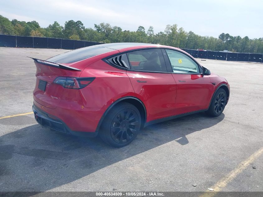 2023 Tesla Model Y Awd/Long Range Dual Motor All-Wheel Drive VIN: 7SAYGDEE4PF707613 Lot: 40534509