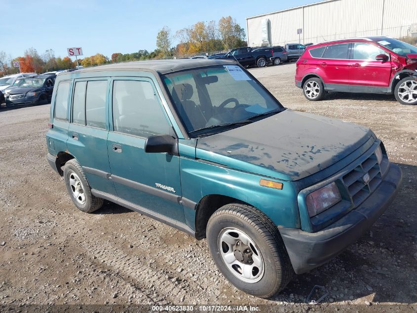 1998 Chevrolet Tracker VIN: 2CNBJ1363W6906702 Lot: 40623830