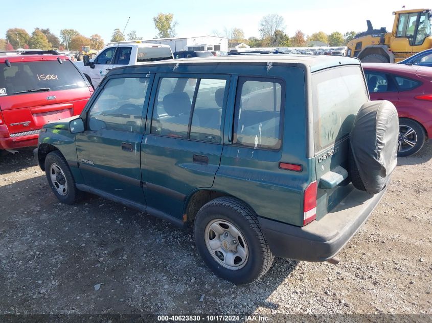 1998 Chevrolet Tracker VIN: 2CNBJ1363W6906702 Lot: 40623830