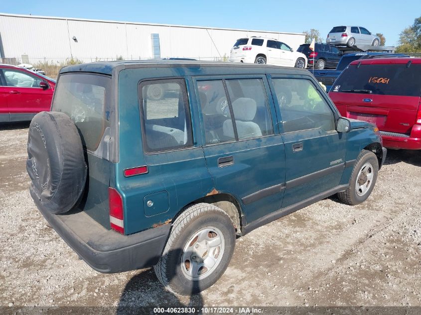 1998 Chevrolet Tracker VIN: 2CNBJ1363W6906702 Lot: 40623830