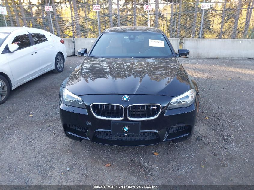 2014 BMW M5 VIN: WBSFV9C59ED594023 Lot: 40775431