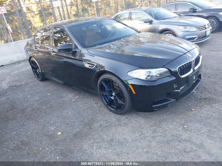 2014 BMW M5 VIN: WBSFV9C59ED594023 Lot: 40775431