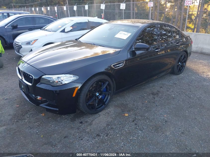 2014 BMW M5 VIN: WBSFV9C59ED594023 Lot: 40775431