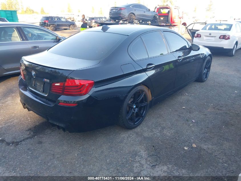 2014 BMW M5 VIN: WBSFV9C59ED594023 Lot: 40775431