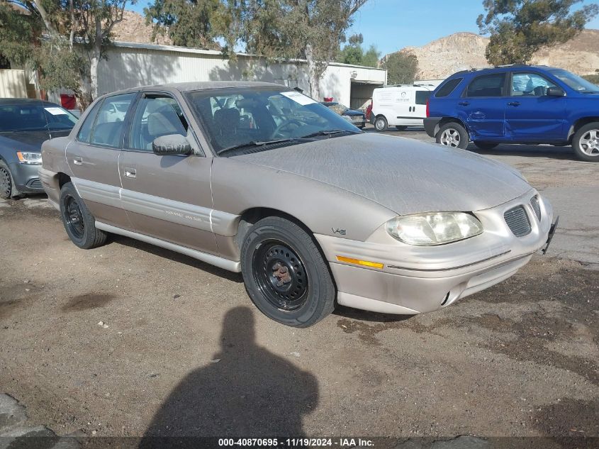 1996 Pontiac Grand Am Se VIN: 1G2NE52M5TC716243 Lot: 40870695