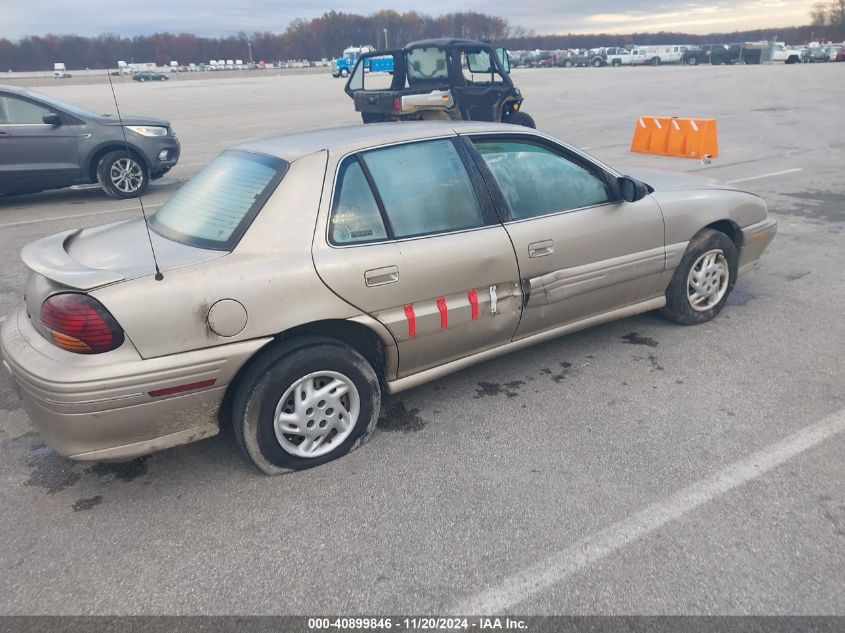 1997 Pontiac Grand Am Se VIN: 1G2NE52T1VM565468 Lot: 40899846