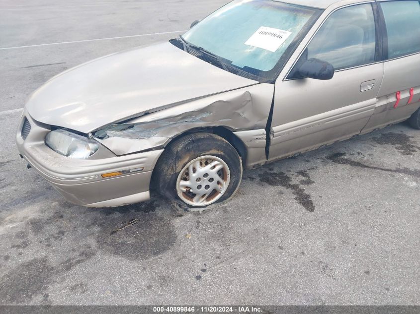 1997 Pontiac Grand Am Se VIN: 1G2NE52T1VM565468 Lot: 40899846