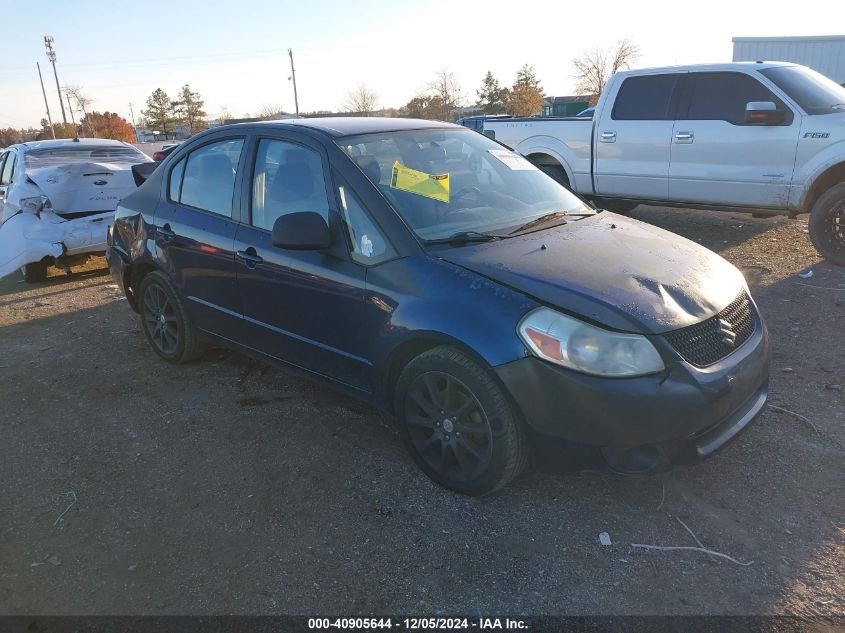 2011 Suzuki Sx4 Le/Le Anniversary Edition VIN: JS2YC5A2XB6303042 Lot: 40905644