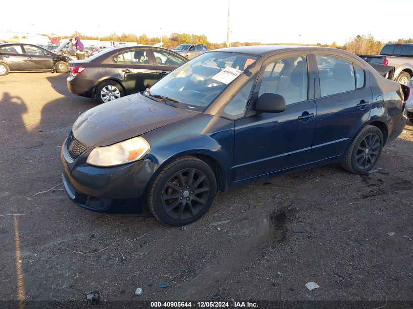 2011 Suzuki Sx4 Le/Le Anniversary Edition VIN: JS2YC5A2XB6303042 Lot: 40905644