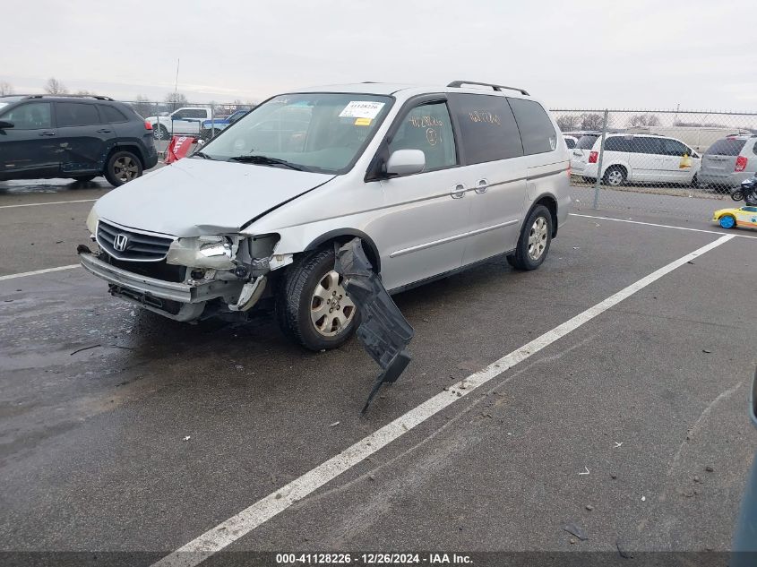 2002 Honda Odyssey Ex VIN: 2HKRL18692H577788 Lot: 41128226