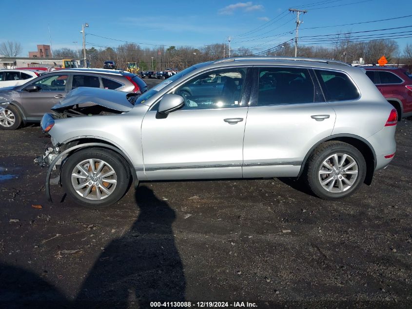 2014 Volkswagen Touareg 3.6L Sport VIN: WVGEF9BP4ED013638 Lot: 41130088