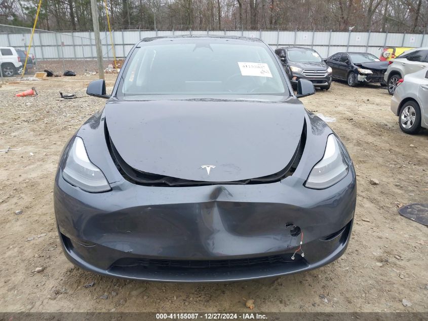 2023 Tesla Model Y Awd/Long Range Dual Motor All-Wheel Drive VIN: 7SAYGDEE4PF709796 Lot: 41155087