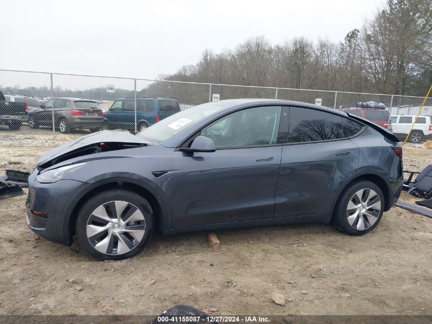 2023 Tesla Model Y Awd/Long Range Dual Motor All-Wheel Drive VIN: 7SAYGDEE4PF709796 Lot: 41155087