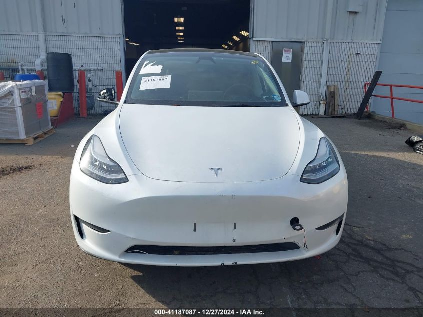 2023 Tesla Model Y Awd/Long Range Dual Motor All-Wheel Drive VIN: 7SAYGDEE2PA155638 Lot: 41187087