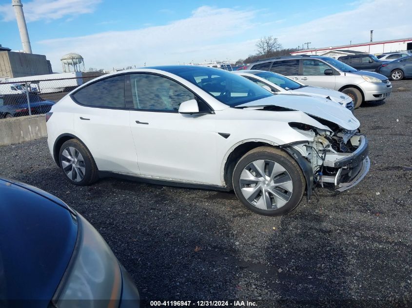 2023 Tesla Model Y Awd/Long Range Dual Motor All-Wheel Drive VIN: 7SAYGAEE9PF598970 Lot: 41196947