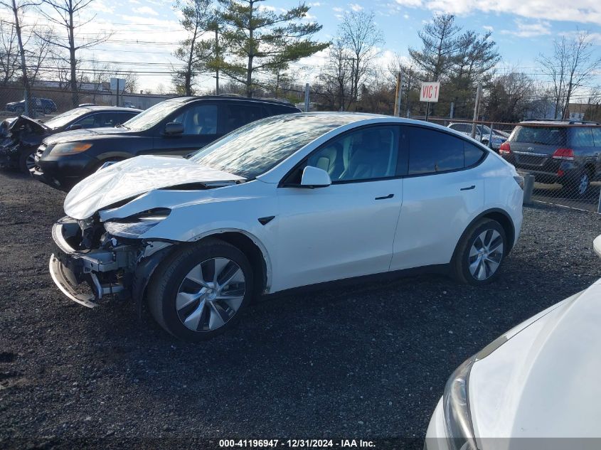 2023 Tesla Model Y Awd/Long Range Dual Motor All-Wheel Drive VIN: 7SAYGAEE9PF598970 Lot: 41196947