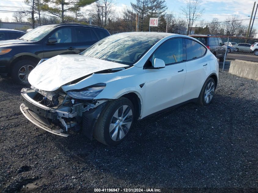 2023 Tesla Model Y Awd/Long Range Dual Motor All-Wheel Drive VIN: 7SAYGAEE9PF598970 Lot: 41196947