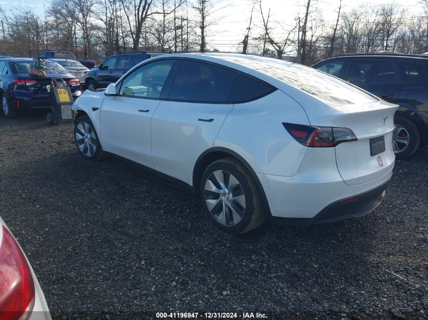 2023 Tesla Model Y Awd/Long Range Dual Motor All-Wheel Drive VIN: 7SAYGAEE9PF598970 Lot: 41196947