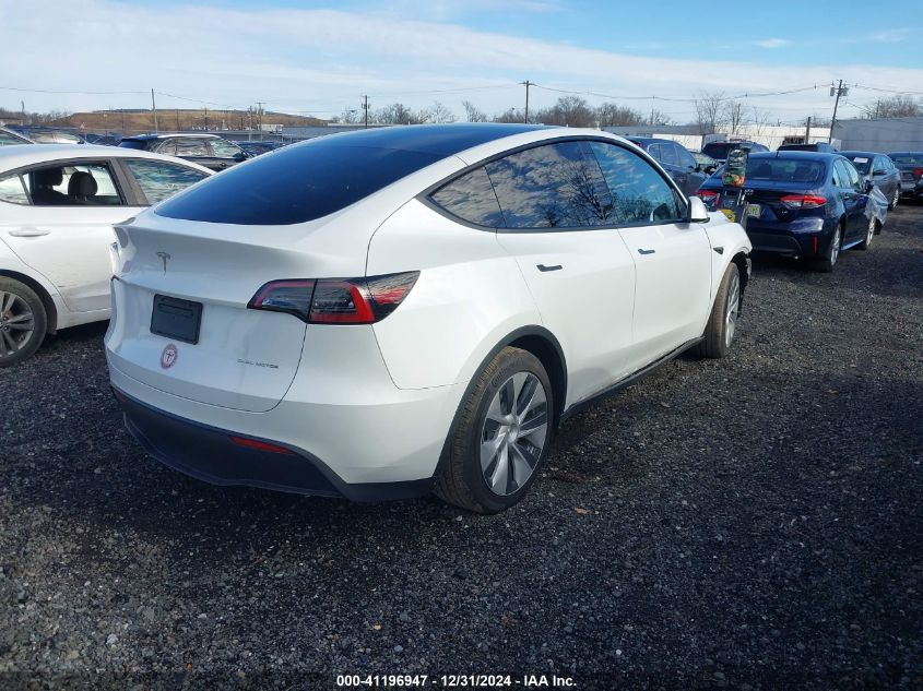 2023 Tesla Model Y Awd/Long Range Dual Motor All-Wheel Drive VIN: 7SAYGAEE9PF598970 Lot: 41196947