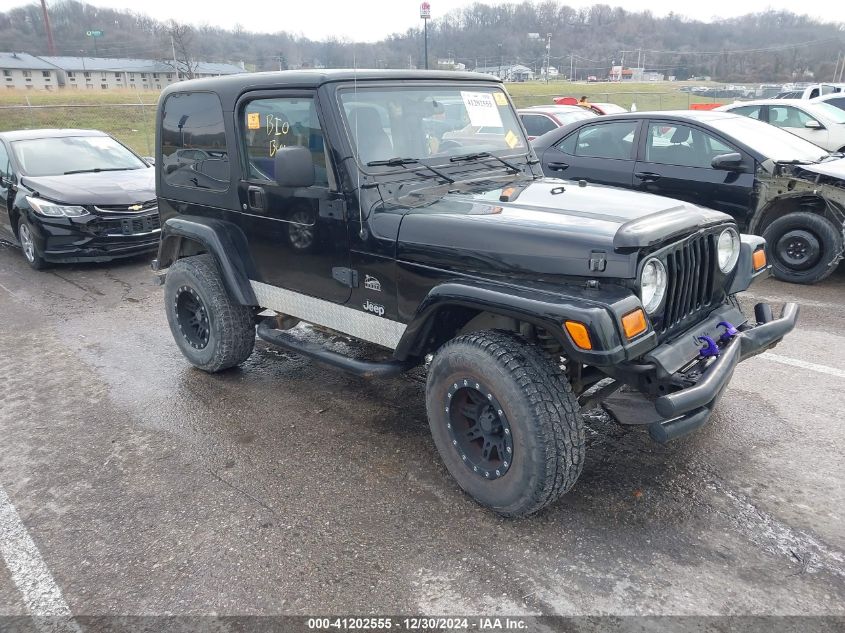 2004 Jeep Wrangler / Tj Sahara VIN: 1J4FA59SX4P742275 Lot: 41202555